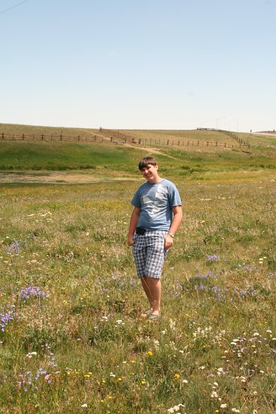 Trip (213).JPG - Kris in the meadow outside of Bear Lake Lodge, Wyoming